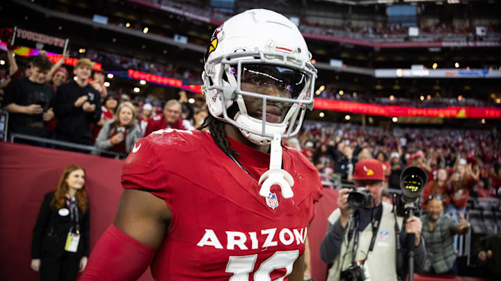 Jan 5, 2025; Glendale, Arizona, USA; Arizona Cardinals wide receiver Marvin Harrison Jr. (18) against the San Francisco 49ers at State Farm Stadium. Mandatory Credit: Mark J. Rebilas-Imagn Images