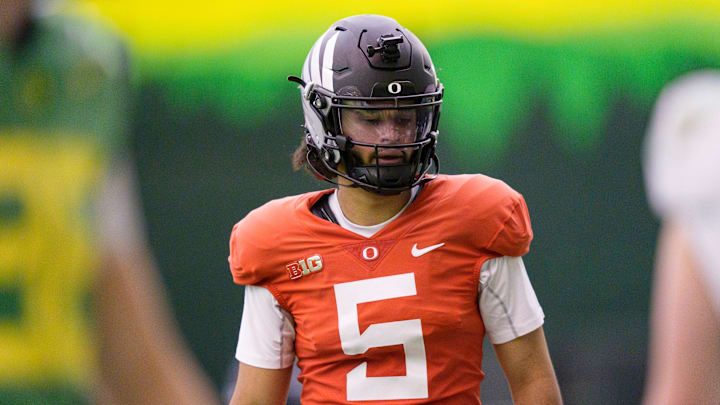 Oregon QB Dante Moore drew approbation for his choice to return to college. 