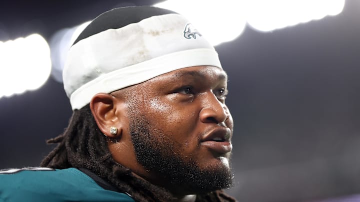 Philadelphia Eagles defensive tackle Jalen Carter walks off the field after being ejected during the first quarter of the game against the Dallas Cowboys.