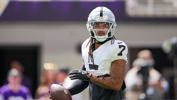 Aug 10, 2024; Minneapolis, Minnesota, USA; Las Vegas Raiders safety Tre'von Moehrig (7) warms up before the game against the Minnesota Vikings  at U.S. Bank Stadium. Mandatory Credit: Brad Rempel-Imagn Images