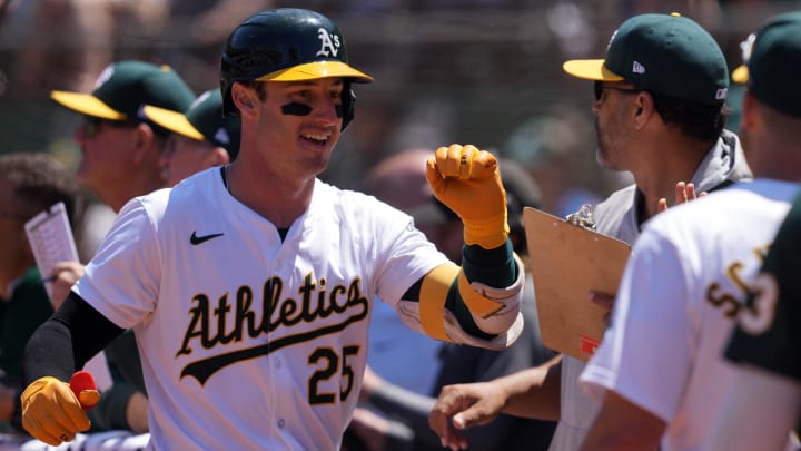 Jun 9, 2024; Oakland, California, USA; Oakland Athletics designated hitter Brent Rooker (25) is congratulated by teammates after hitting a home run against the Toronto Blue Jays during the sixth inning at Oakland-Alameda County Coliseum. Mandatory Credit: Darren Yamashita-USA TODAY Sports Jun 9, 2024; Oakland, California, USA; Oakland Athletics designated hitter Brent Rooker (25) is congratulated by teammates after hitting a home run against the Toronto Blue Jays during the sixth inning at Oakland-Alameda County Coliseum. Mandatory Credit: Darren Yamashita-USA TODAY Sports
