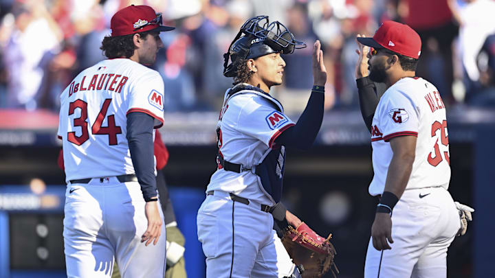 Oct 1, 2025: Cleveland Guardians center fielder Chase DeLauter (34), catcher Bo Naylor (23) and outfielder George Valera (35) celebrate after winning game two of the Wildcard round for the 2025 MLB playoffs against the Detroit Tigers at Progressive Field. 