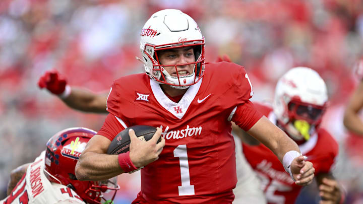 Oct 18, 2025; Houston, Texas, USA; Houston Cougars quarterback Conner Weigman (1) runs the ball into the end zone for a touchdown during the second quarter against the Arizona Wildcats at TDECU Stadium. Mandatory Credit: Maria Lysaker-Imagn Images Oct 18, 2025; Houston, Texas, USA; Houston Cougars quarterback Conner Weigman (1) runs the ball into the end zone for a touchdown during the second quarter against the Arizona Wildcats at TDECU Stadium. Mandatory Credit: Maria Lysaker-Imagn Images