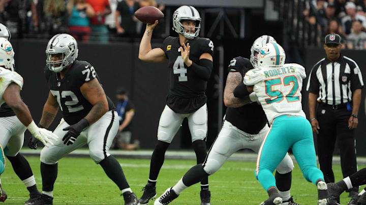 Las Vegas Raiders quarterback Derek Carr (4) throws the ball in the first quarter against the Miami Dolphins at Allegiant Stadium. 