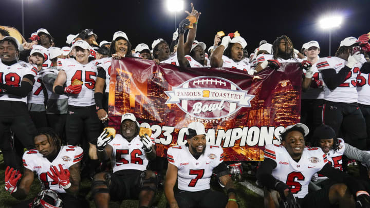 Dec 18, 2023; Charlotte, NC, USA; Western Kentucky Hilltoppers celebrate their win after the second half against the Old Dominion Monarchs at Charlotte 49ers' Jerry Richardson Stadium. Mandatory Credit: Jim Dedmon-USA TODAY Sports