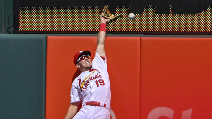 May 29, 2023; St. Louis, Missouri, USA;  St. Louis Cardinals right fielder Tommy Edman (19) leaps at