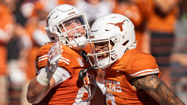 Texas Longhorns wide receiver DeAndre Moore Jr. (0) celebrates scoring a touchdown with Texas Longhorns wide receiver Ty Boatright (89) as the Texas Longhorns take on Mississippi State at Darrell K Royal-Texas Memorial Stadium in Austin Saturday, Sept. 28, 2024.