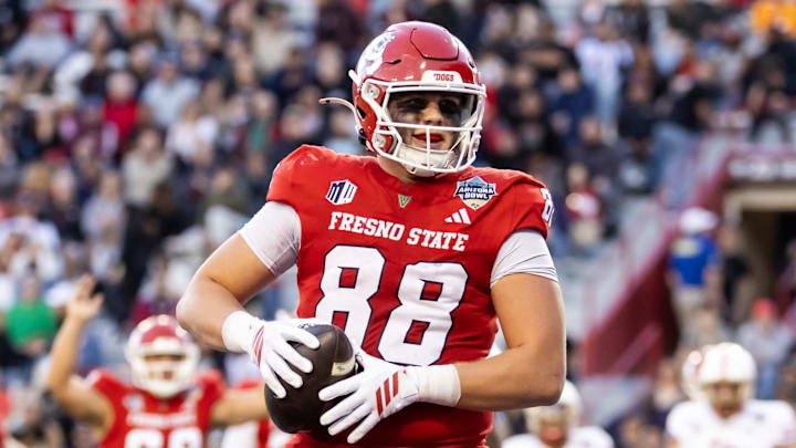 Dec 27, 2025; Tucson, AZ, USA; Fresno State Bulldogs tight end Richie Anderson III (88) scores a touchdown against the Miami (OH) RedHawks during the Snoop Dogg Arizona Bowl at Casino Del Sol Stadium. Mandatory Credit: Mark J. Rebilas-Imagn Images