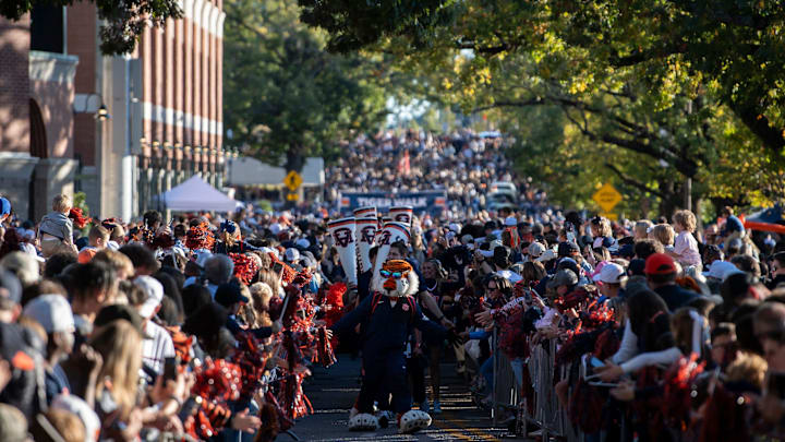Aubie greets fans during Tiger Walk before Auburn Tigers take on Kentucky Wildcats in Auburn, Ala. on Saturday, Nov. 1, 2025.
