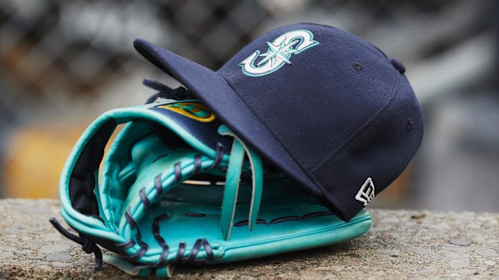 May 12, 2018; Detroit, MI, USA; Hat and glove of Seattle Mariners center fielder Dee Gordon (9) sits in dugout during the third inning against the Detroit Tigers at Comerica Park. Mandatory Credit: Rick Osentoski-Imagn Images