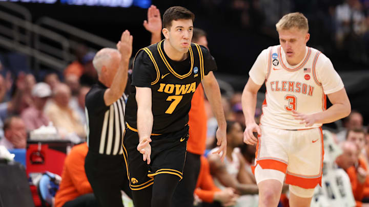 Mar 20, 2026; Tampa, FL, USA; Iowa Hawkeyes forward Alvaro Folgueiras (7) celebrates a three-pointer in the first half against the Clemson Tigers during a first-round game of the men's 2026 NCAA Tournament at Benchmark International Arena. Mandatory Credit: Matt Pendleton-Imagn Images