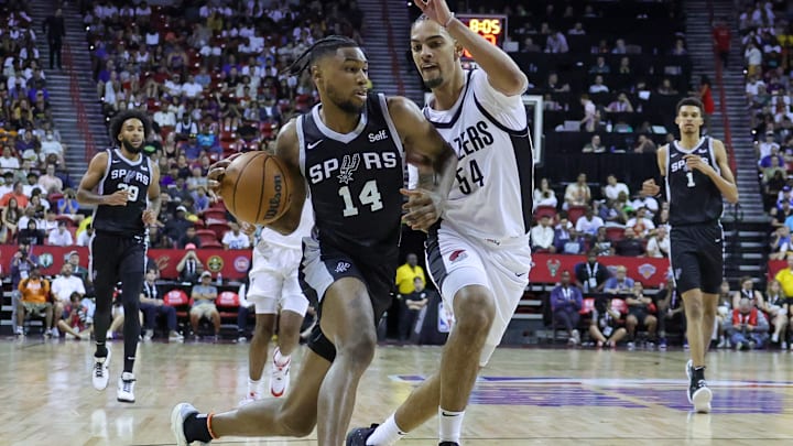2023 NBA Summer League - San Antonio Spurs v Portland Trail Blazers - Julian Champagnie (left), Blake Wesley (center), Victor Wembanyama (right)