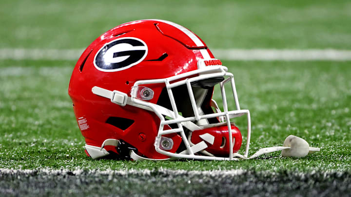 Jan 10, 2022; Indianapolis, IN, USA; A Georgia Bulldogs helmet sits on the field after the Georgia Bulldogs beat the Alabama Crimson Tide in the 2022 CFP college football national championship game at Lucas Oil Stadium. Mandatory Credit: Trevor Ruszkowski-Imagn Images