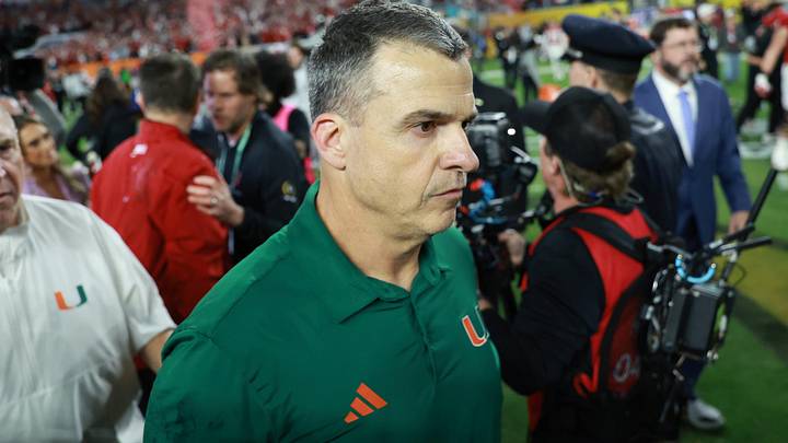 Jan 19, 2026; Miami Gardens, FL, USA; Miami Hurricanes head coach Mario Cristobal reacts after the College Football Playoff National Championship game at Hard Rock Stadium. Mandatory Credit: Mark J. Rebilas-Imagn Images Jan 19, 2026; Miami Gardens, FL, USA; Miami Hurricanes head coach Mario Cristobal reacts after the College Football Playoff National Championship game at Hard Rock Stadium. Mandatory Credit: Mark J. Rebilas-Imagn Images