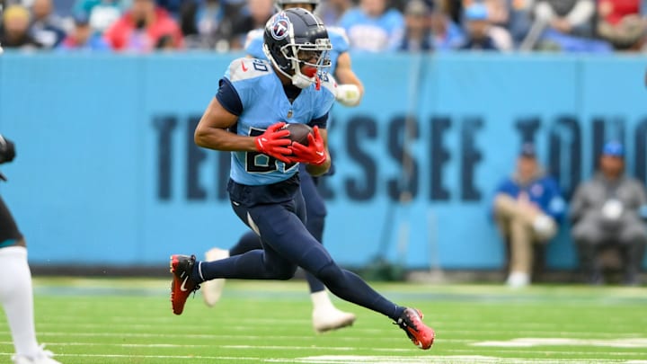 Dec 8, 2024; Nashville, Tennessee, USA; Tennessee Titans wide receiver Bryce Oliver runs the ball after a made catch against the Jacksonville Jaguars during the first half at Nissan Stadium. Mandatory Credit: Steve Roberts-Imagn Images Dec 8, 2024; Nashville, Tennessee, USA; Tennessee Titans wide receiver Bryce Oliver runs the ball after a made catch against the Jacksonville Jaguars during the first half at Nissan Stadium. Mandatory Credit: Steve Roberts-Imagn Images