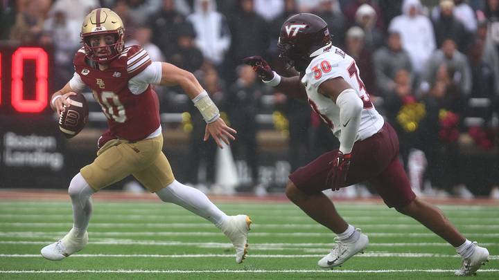 Sep 26, 2026; Chestnut Hill, Massachusetts, USA;  Boston College Eagles quarterback Mason McKenzie (10) scrambles in the second half against the Virginia Tech Hokies at Alumni Stadium.  Mandatory Credit: Edward Finan-Imagn Images