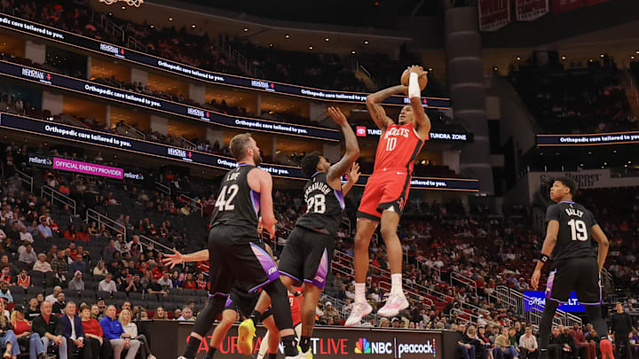 Feb 23, 2026; Houston, Texas, USA; Houston Rockets forward Jabari Smith Jr. (10) shoots against Utah Jazz forward Brice Sensabaugh (28)  in the second half at Toyota Center. Mandatory Credit: Thomas Shea-Imagn Images