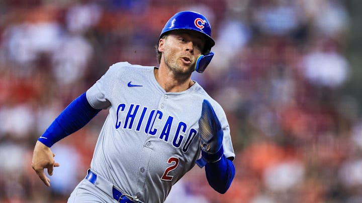 Sep 19, 2025; Cincinnati, Ohio, USA; Chicago Cubs second baseman Nico Hoerner (2) scores on a RBI double hit by outfielder Ian Happ (not pictured) in the third inning against the Cincinnati Reds at Great American Ball Park. Mandatory Credit: Katie Stratman-Imagn Images Sep 19, 2025; Cincinnati, Ohio, USA; Chicago Cubs second baseman Nico Hoerner (2) scores on a RBI double hit by outfielder Ian Happ (not pictured) in the third inning against the Cincinnati Reds at Great American Ball Park. Mandatory Credit: Katie Stratman-Imagn Images
