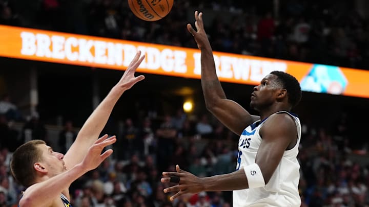 Apr 10, 2024; Denver, Colorado, USA; Minnesota Timberwolves guard Anthony Edwards (5) shoots over
