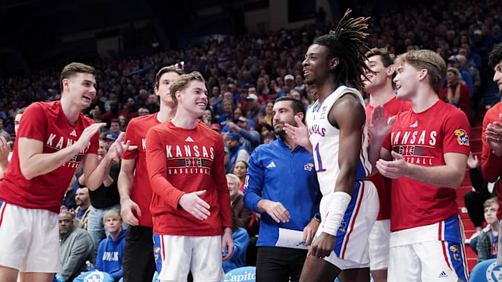 Nov 28, 2023; Lawrence, Kansas, USA; Kansas Jayhawks guard Jamari McDowell (11) celebrates with team mates against the Eastern Illinois Panthers during the second half at Allen Fieldhouse. Mandatory Credit: Denny Medley-Imagn Images Nov 28, 2023; Lawrence, Kansas, USA; Kansas Jayhawks guard Jamari McDowell (11) celebrates with team mates against the Eastern Illinois Panthers during the second half at Allen Fieldhouse. Mandatory Credit: Denny Medley-Imagn Images