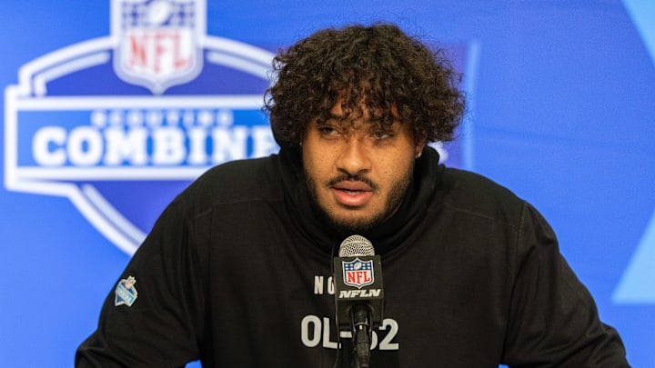 Mar 2, 2024; Indianapolis, IN, USA; Arizona offensive lineman Jordan Morgan (OL52) talks to the
