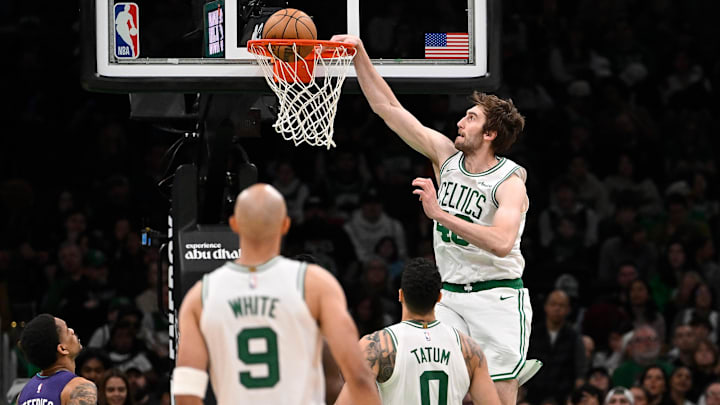 Apr 11, 2025; Boston, Massachusetts, USA; Boston Celtics center Luke Kornet (40) dunks the ball against the Charlotte Hornets during the second half at TD Garden. Mandatory Credit: Eric Canha-Imagn Images