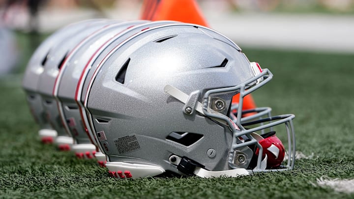 Sep 2, 2023; Bloomington, Indiana, USA; Ohio State Buckeyes helmets sit on the sideline prior to the NCAA football game at Indiana University Memorial Stadium. Ohio State won 23-3.