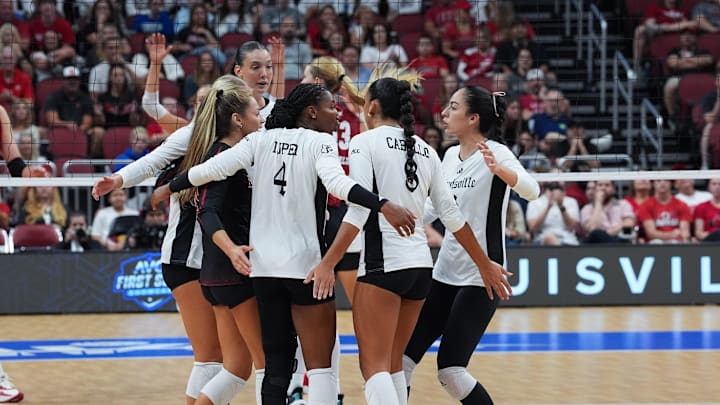 Action during the Louisville versus Wisconsin volleyball match at the AVCA First Serve Showcase at the KFC Yum! Center in Louisville, Ky. on Aug. 27, 2024