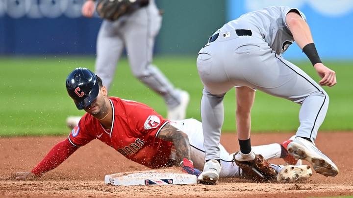 Sep 14, 2026: Cleveland Guardians shortstop Brayan Rocchio (4) is caught stealing by Chicago White Sox shortstop Colson Montgomery (12) during the third inning at Progressive Field. Credit: Ken Blaze-Imagn Images