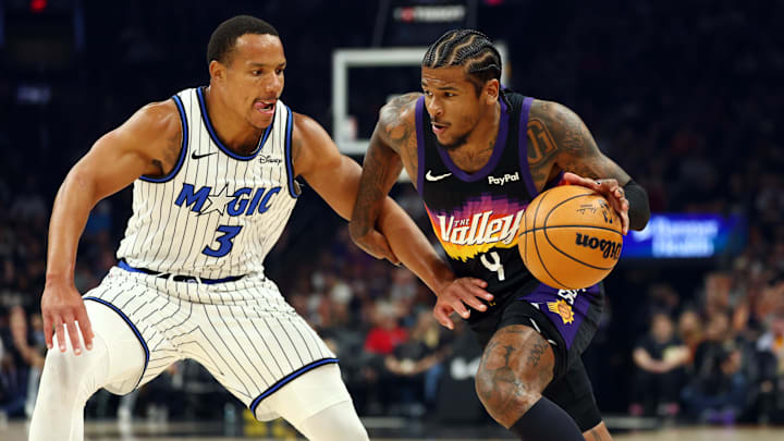 Feb 21, 2026; Phoenix, Arizona, USA; Orlando Magic guard Desmond Bane (3) defends against Phoenix Suns guard Jalen Green (4) in the first half at Mortgage Matchup Center. Mandatory Credit: Mark J. Rebilas-Imagn Images