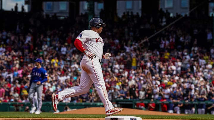 May 8, 2025; Boston, Massachusetts, USA; Boston Red Sox designated hitter Rafael Devers (11) hits a home run against the Texas Rangers in the seventh inning at Fenway Park. Mandatory Credit: David Butler II-Imagn Images May 8, 2025; Boston, Massachusetts, USA; Boston Red Sox designated hitter Rafael Devers (11) hits a home run against the Texas Rangers in the seventh inning at Fenway Park. Mandatory Credit: David Butler II-Imagn Images