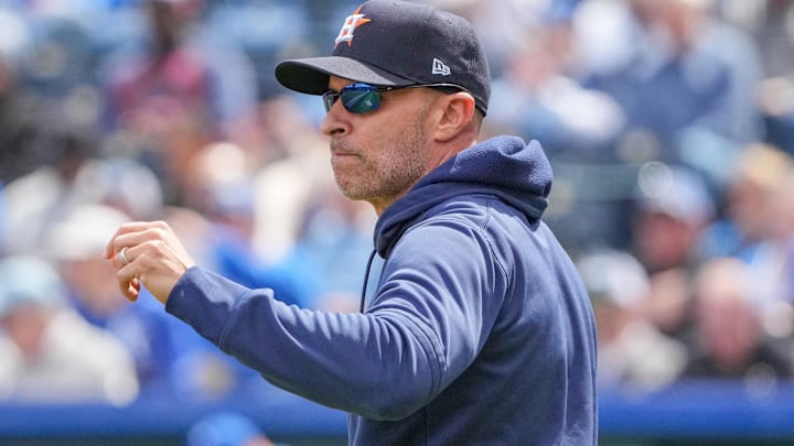 Apr 11, 2024; Kansas City, Missouri, USA; Houston Astros manager Joe Espada (19) signals to the