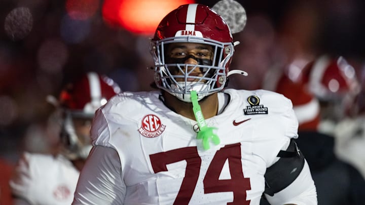 Dec 19, 2025; Norman, OK, USA; Alabama Crimson Tide offensive lineman Kadyn Proctor (74) against the Oklahoma Sooners during the CFP National Playoff First Round at Gaylord Family Oklahoma Memorial Stadium. Mandatory Credit: Mark J. Rebilas-Imagn Images