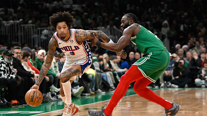 Dec 25, 2024; Boston, Massachusetts, USA; Philadelphia 76ers guard Kelly Oubre Jr. (9) dribbles against Boston Celtics guard Jaylen Brown (7) during the first half at TD Garden. Mandatory Credit: Eric Canha-Imagn Images Dec 25, 2024; Boston, Massachusetts, USA; Philadelphia 76ers guard Kelly Oubre Jr. (9) dribbles against Boston Celtics guard Jaylen Brown (7) during the first half at TD Garden. Mandatory Credit: Eric Canha-Imagn Images