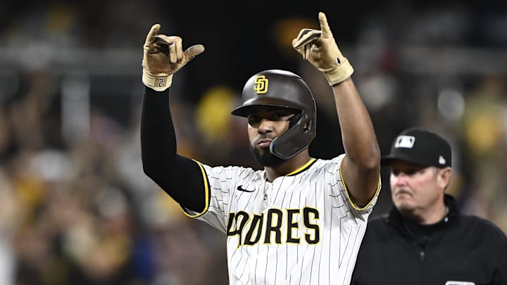 Aug 23, 2025; San Diego, California, USA; San Diego Padres shortstop Xander Bogaerts (2) celebrates after hitting an RBI double during the eighth inning against the Los Angeles Dodgers at Petco Park. Mandatory Credit: Denis Poroy-Imagn Images