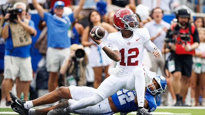 Sep 12, 2026; Lexington, Kentucky, USA; Alabama Crimson Tide quarterback Keelon Russell (12) throws a pass under pressure from Kentucky Wildcats linebacker Grant Godfrey (22) during the first quarter at Kroger Field. Mandatory Credit: Jordan Prather-Imagn Images Sep 12, 2026; Lexington, Kentucky, USA; Alabama Crimson Tide quarterback Keelon Russell (12) throws a pass under pressure from Kentucky Wildcats linebacker Grant Godfrey (22) during the first quarter at Kroger Field. Mandatory Credit: Jordan Prather-Imagn Images