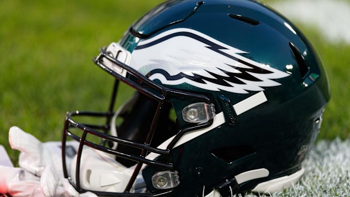 Sep 26, 2019; Green Bay, WI, USA; A Philadelphia Eagles helmet sits on the field during warmups prior to the game against the Green Bay Packers at Lambeau Field. Mandatory Credit: Jeff Hanisch-Imagn Images