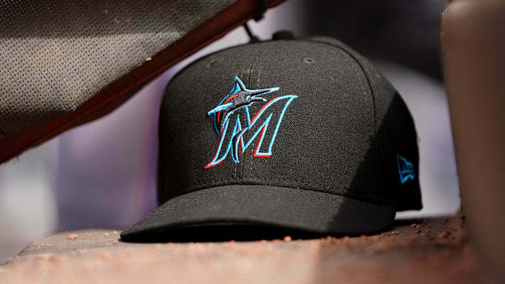 Apr 11, 2019; Cincinnati, OH, USA; A view of a New Era Miami Marlins hat in the dugout during the game against the Cincinnati Reds at Great American Ball Park.
