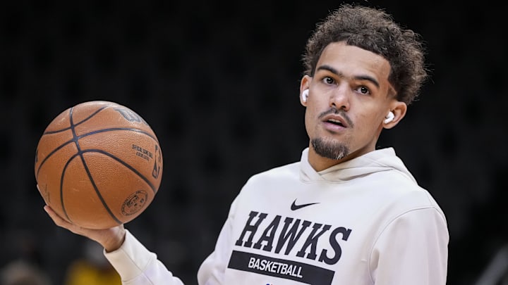 Feb 9, 2023; Atlanta, Georgia, USA; Atlanta Hawks guard Trae Young (11) warms up on the court prior to the game against the Phoenix Suns at State Farm Arena. Mandatory Credit: Dale Zanine-Imagn Images