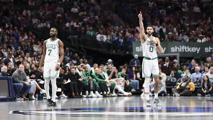 Jan 25, 2025; Dallas, Texas, USA;  Boston Celtics forward Jayson Tatum (0) and Boston Celtics guard Jaylen Brown (7) react during the second half against the Dallas Mavericks at American Airlines Center. Mandatory Credit: Kevin Jairaj-Imagn Images