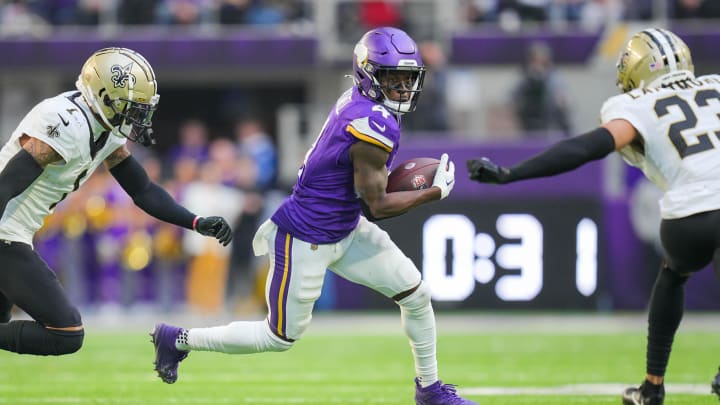 Nov 12, 2023; Minneapolis, Minnesota, USA; Minnesota Vikings wide receiver Brandon Powell (4) runs after the catch against the New Orleans Saints in the third quarter at U.S. Bank Stadium. Mandatory Credit: Brad Rempel-USA TODAY Sports