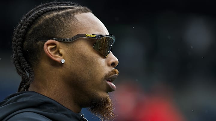Dec 22, 2024; Seattle, Washington, USA; Minnesota Vikings wide receiver Justin Jefferson (18) participates in pregame warmups against the Seattle Seahawks at Lumen Field.