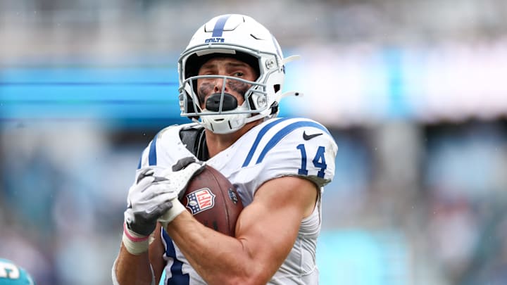 Oct 6, 2024; Jacksonville, Florida, USA; Indianapolis Colts wide receiver Alec Pierce (14) scores a touchdown against the Jacksonville Jaguars in the fourth quarter at EverBank Stadium. Mandatory Credit: Nathan Ray Seebeck-Imagn Images