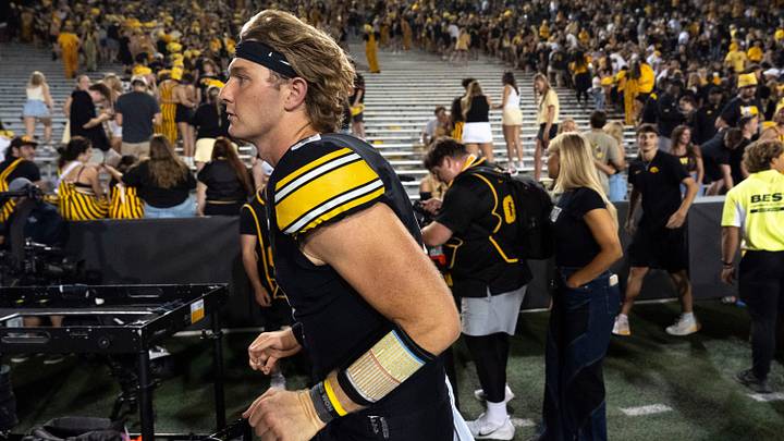 Iowa Hawkeyes quarterback Hank Brown (9) runs off field after the Hawkeyes defeated the Cyclones 16-13 in the Cy-Hawk rivalry game Sept. 12, 2026 at Kinnick Stadium in Iowa City, Iowa.