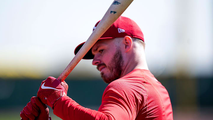 Cincinnati Reds infielder Gavin Lux (2) practices his swing before heading up to the plate to bat during spring training, Friday, Feb. 21, 2025, at the Cincinnati Reds Player Development Complex in Goodyear, Ariz.