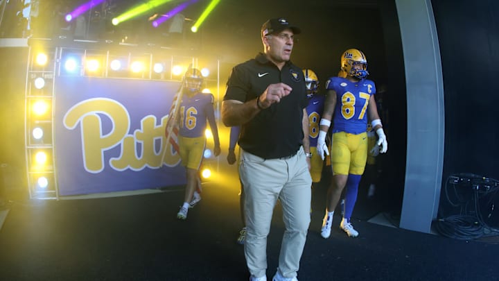 Oct 4, 2025; Pittsburgh, Pennsylvania, USA;  Pittsburgh Panthers head coach Pat Narduzzi leads the team from the tunnel to play the Boston College Eagles at Acrisure Stadium. Mandatory Credit: Charles LeClaire-Imagn Images