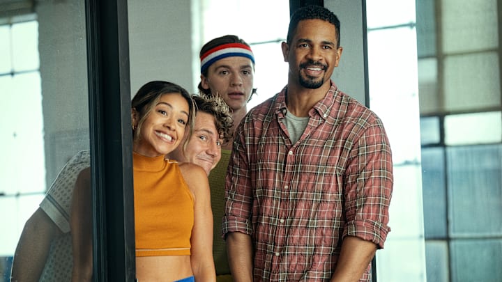Players. (L-R) Gina Rodriguez as Mack, Augustus Prew as Brannagan, Joel Courtney as Little and Damon Wayans Jr. as Adam in Players. Cr. K.C. Bailey/Netflix ©2023.
