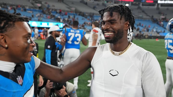 Aug 8, 2025: Cleveland Browns quarterback Shedeur Sanders with Carolina Panthers wide receiver Jimmy Horn Jr.