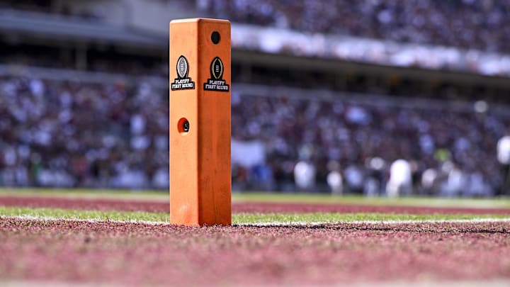 A view of the CFP logo on a touchdown pylon during the game between the Aggies and the Hurricanes at Kyle Field.