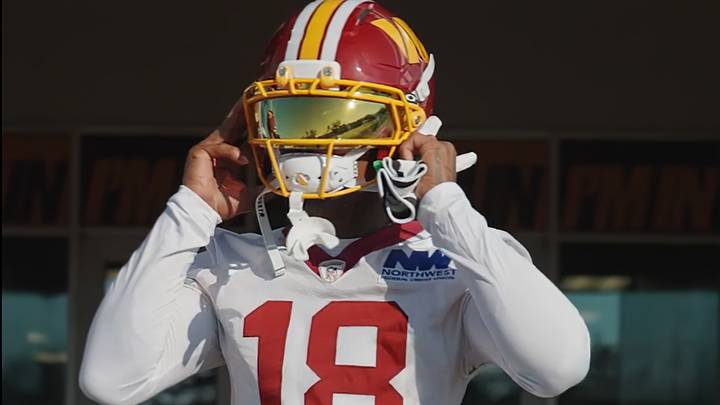 Washington Commanders wide receiver Stefon Diggs adjusts his helmet during his first training camp practice with the team in Ashburn, Virginia. Washington Commanders wide receiver Stefon Diggs adjusts his helmet during his first training camp practice with the team in Ashburn, Virginia.